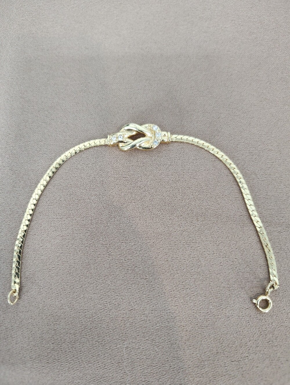 Vintage Avon Gold-Tone Knot Bracelet with Crystal Accents
